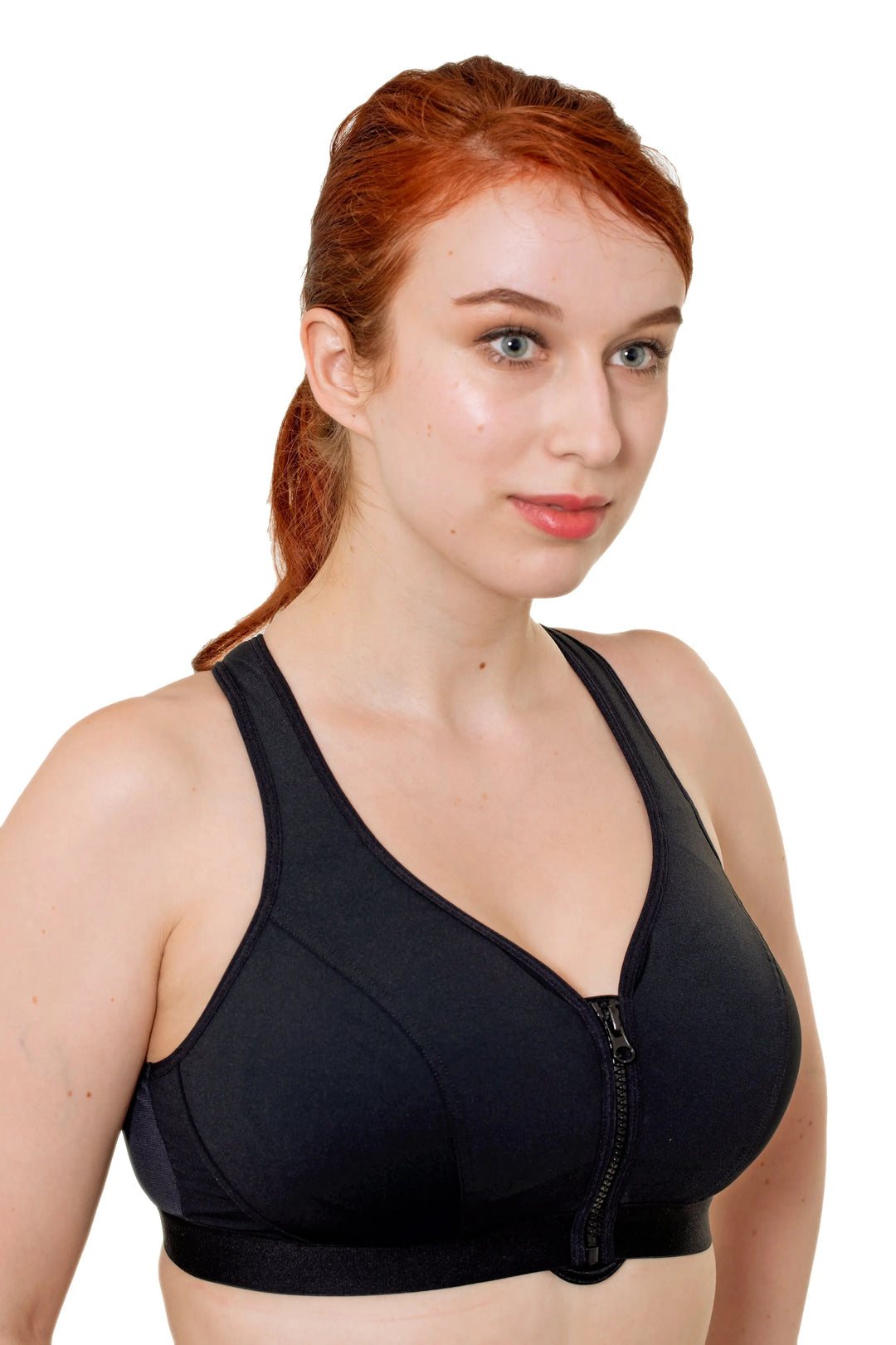 Model wearing the Zip-Front High-Impact Wireless Sports Bra in black, full-coverage double-layer cups and wide supportive band