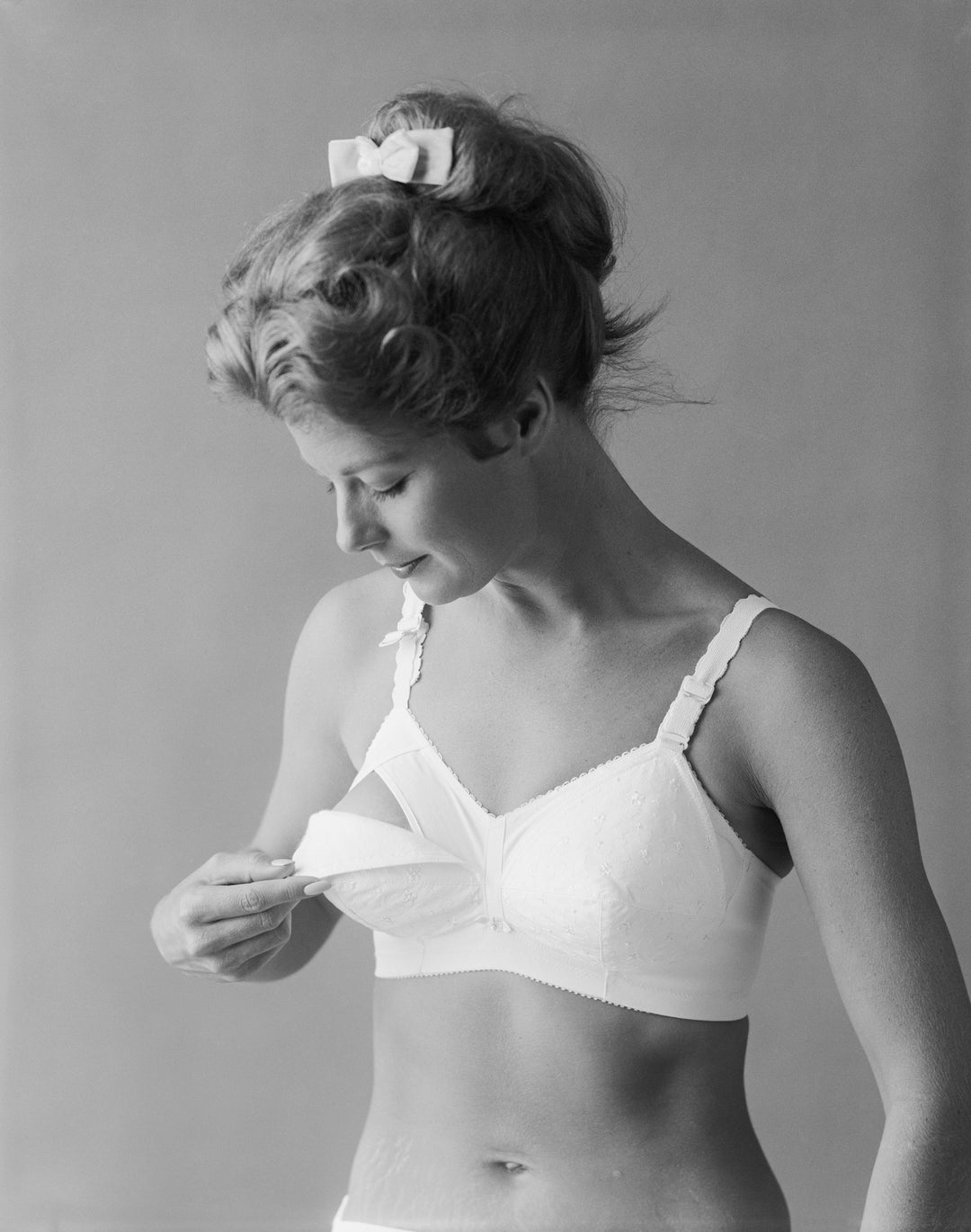 woman wearing a white mastectomy bra